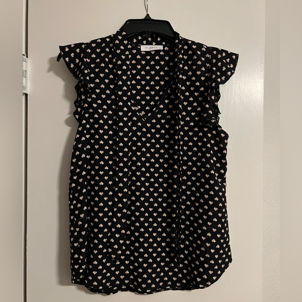 Black Blouse with tan heart accents. Great top for business wear